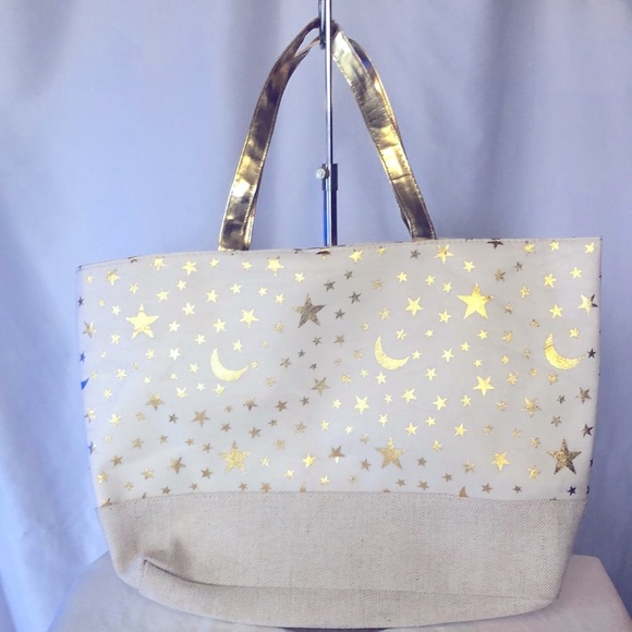 Unbranded cream colored woven tote. Gold moon and stars print. Gold handles. - Picture 1 of 8